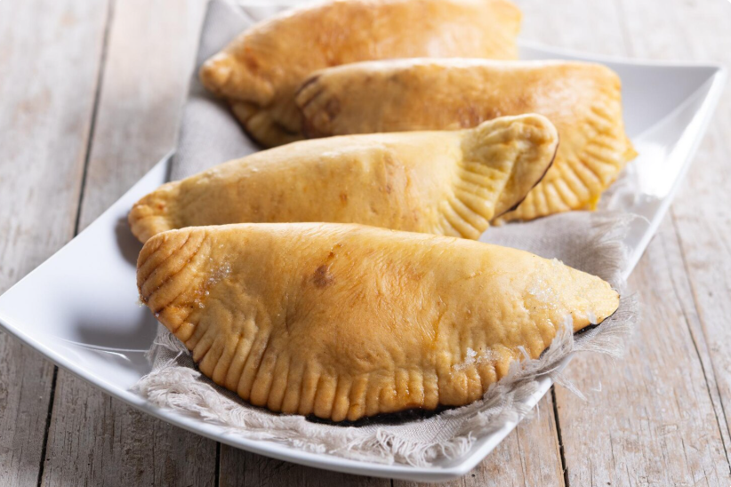 https://modofoods.com/public/storage/photos/1/Blog Pics/Empanadas El Dominicano Houston A Taste of the Caribbean.png